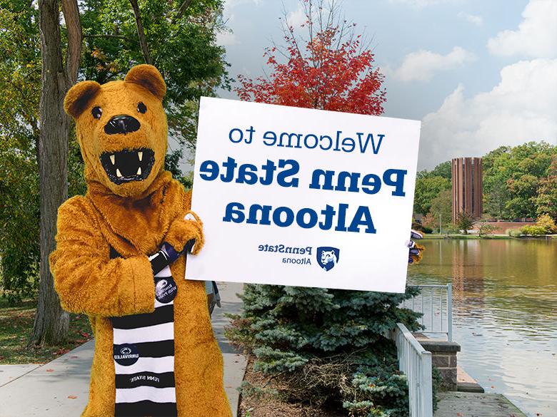 The Nittany Lion mascot holding up a sign reading Welcome to <a href='http://bz.5dexam.com/'>十大网投平台信誉排行榜</a>阿尔图纳分校